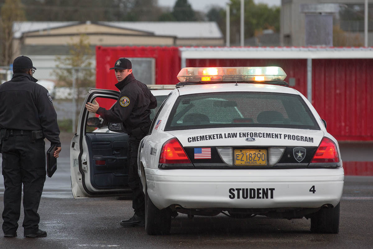 Two male public safety officer and their vehicle